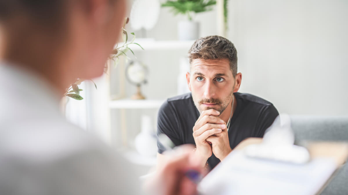 Man with psychologist
