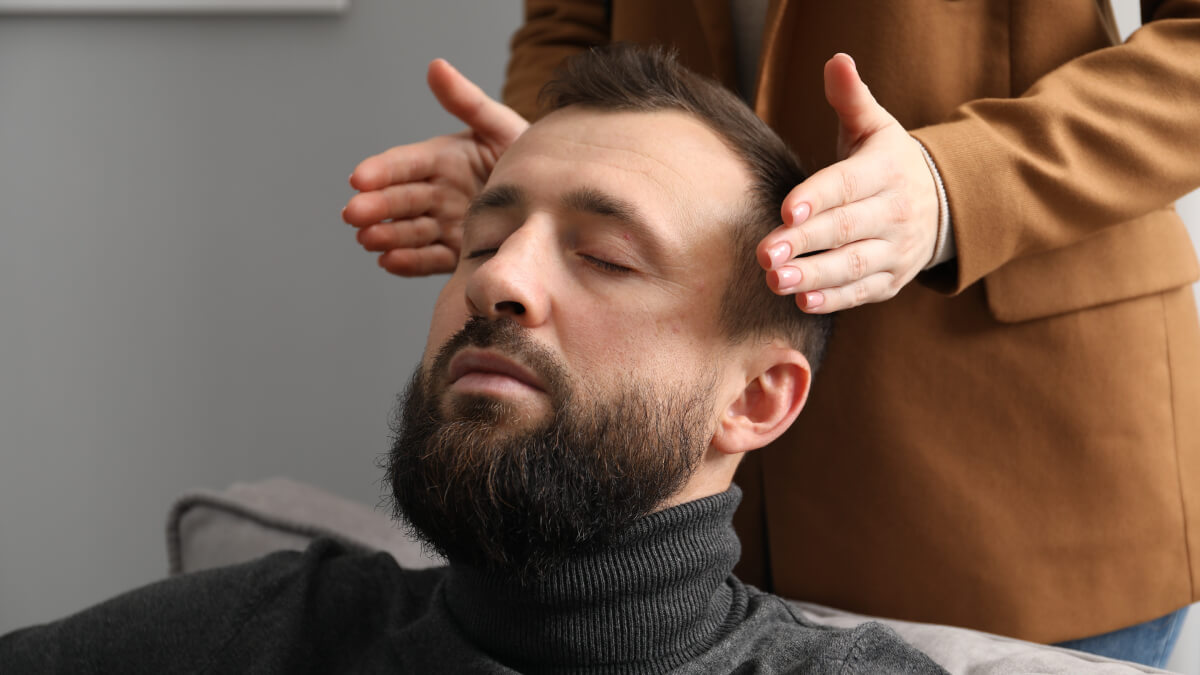Man with eyes closed