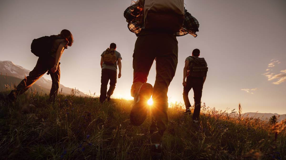 Four people walking