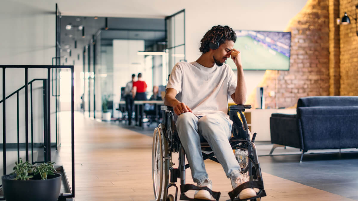 Frustrated man in wheelchair